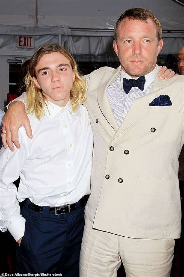 Rocco Ritchie, 18, makes his own style rules in wide leg tweed trousers