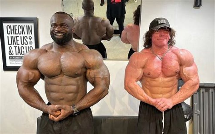 Samson Dauda and Sam Sulek Stand Side by Side Tikkay Khan