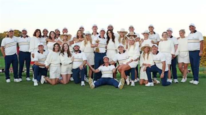 Single Ryder Cup star Viktor Hovland beams as he is kissed by team