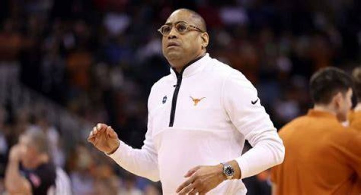 Texas basketball coach got criticized for wearing tight pink leather